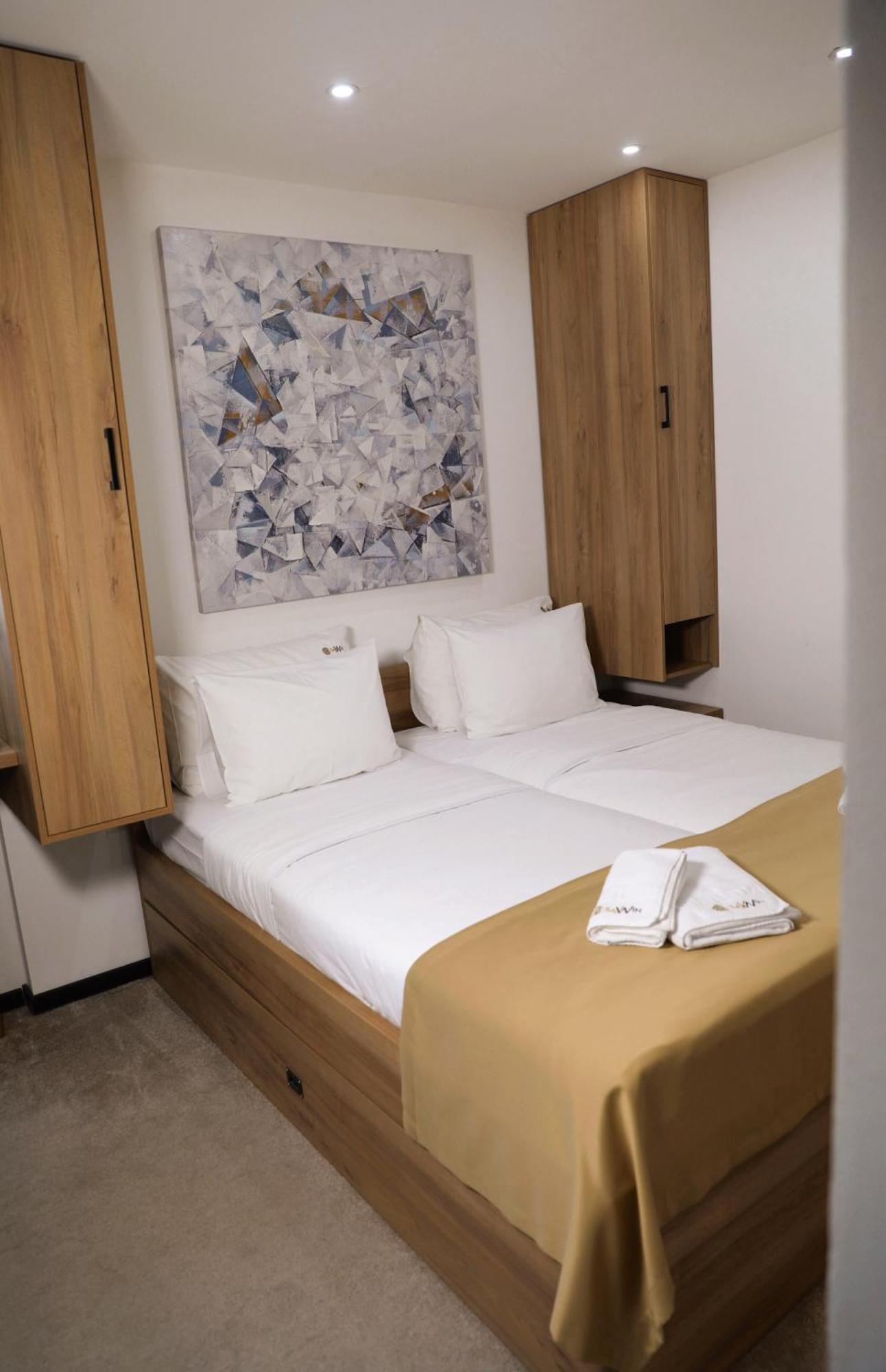 Sax-Win Hotell Pozega Rom bilde